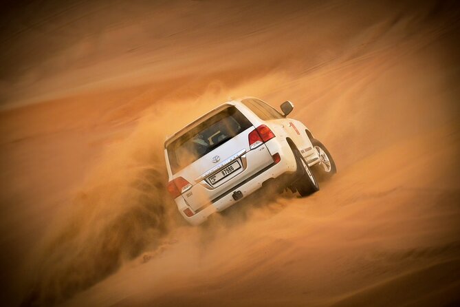 Evening Quad Bike, Desert Safari in Dubai , BBQ Dinner and Shows - Dune bashing across the high red dunes