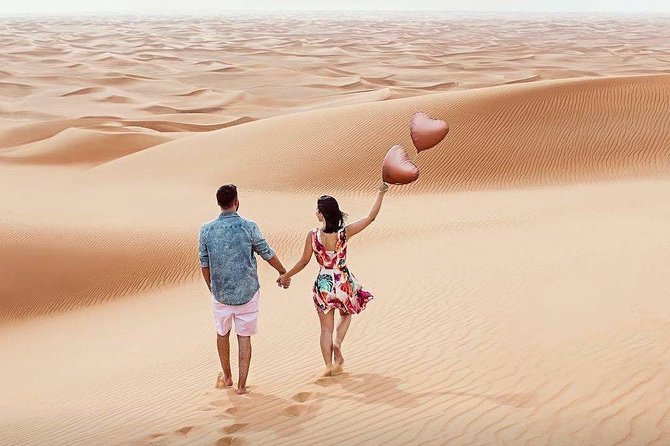 Evening Red Dunes Desert Safari: BBQ Dinner & Adventure Awaits! - Camel riding, henna, and a taste of desert camp life