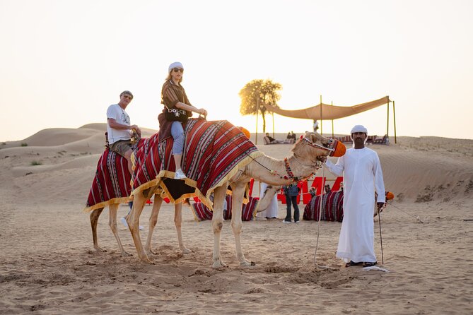 Experience Red Dune Safari Shows, Camels, BBQ & ATV Bike in Dubai - Quad biking on the red sand