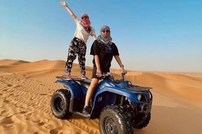 Experience Red Dune Safari Shows, Camels, BBQ & ATV Bike in Dubai - A short camel ride and a desert camp evening
