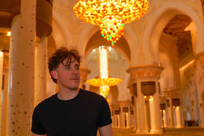 From Dubai: Abu Dhabi Full-Day Trip with Louvre & Grand Mosque - What the guide adds to the experience