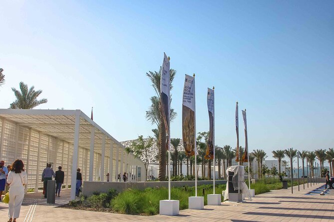 Full Day Small Group Abu Dhabi City Guided Tour - What the guide and vehicle add to the experience