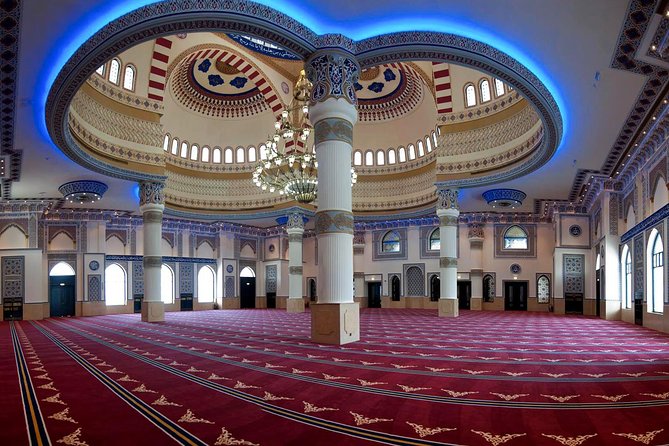 Half-Day Dubai City Tour with Blue Mosque, Creek, Souks & Abra - Crossing Dubai Creek by abra