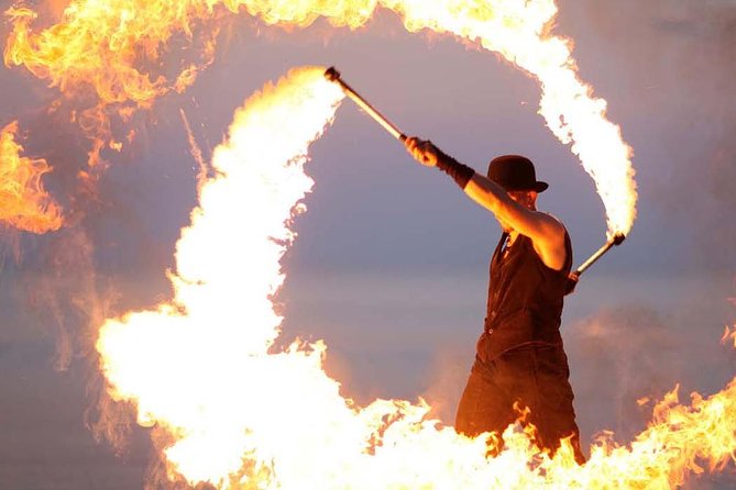Half-Day Dubai Desert Safari With 7 Live Shows and BBQ Dinner - Sandboarding and the changing desert light