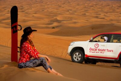 High Red Dunes with Camel Ride, Sandboarding, Falcon Show and VIP BBQ Dinner