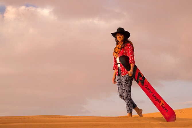 High Red Dunes with Camel Ride, Sandboarding, Falcon Show and VIP BBQ Dinner - Falconry, cultural activities, and the evening program