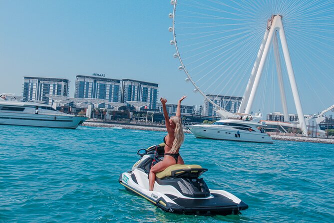 Jet ski Dubai 30 minute Guided Sightseeing Tour - Leaving Dubai Marina by pontoon boat