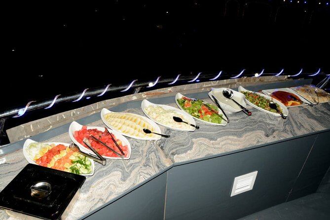 Luxury Dinner at Traditional Dhow Cruise Dubai Marina with Charm - Al Rahim Mosque and Cayan Tower