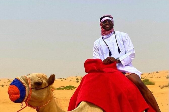Morning Desert Safari, 25 Minutes ATV with 20 minutes Camel Ride - Sandboarding turns the dunes into a playground