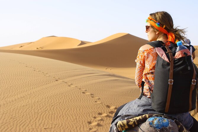 Morning Desert Safari From Abu Dhabi -Camel Ride,Sand Boarding,Camel Farm Visit - Pickup From Abu Dhabi in a 4x4
