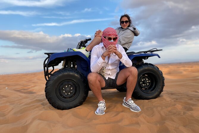 Morning Desert Safari, Quad Bike, Sandboard and Camel Ride - Sandboarding and the desert photo stop