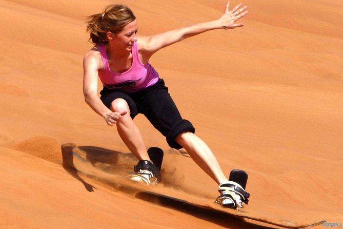 Morning Dubai Desert Dune Bashing and Camel Ride - Sandboarding at the dune viewpoint