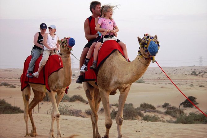 Morning Dubai Desert Safari with Camel Ride & Sand boarding - Leaving Dubai behind at 7:30 am