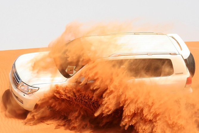 Morning Dubai Desert Safari with Sand boarding and Camel Ride - Red dunes and the main dune-bashing run