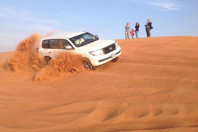 Morning Red Dunes Desert by Quad Bike, Dune Bashing, Camel Ride & Sandboarding - The red-dune quad-bike session