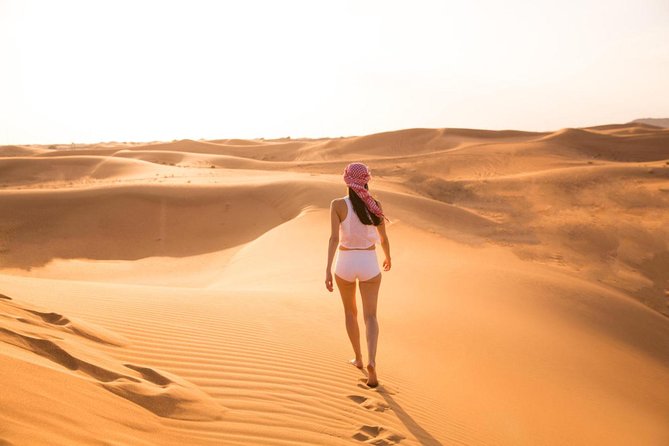 Morning Red Dunes Safari: Camel Ride & Sandboarding Adventure - Key points at a glance