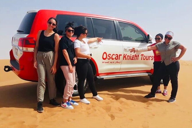 Morning Red Dunes with Camel Ride, Sandboarding and Refreshments - Sandboarding on the red slopes