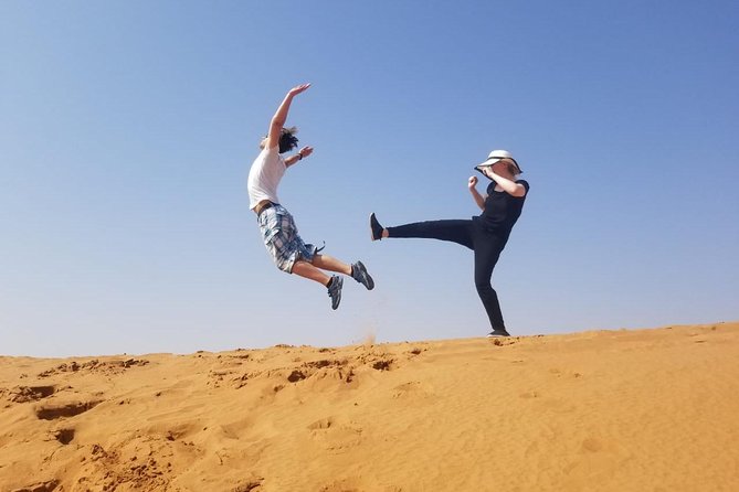 Morning Thrill: Exciting Desert Safari Adventure Camel Ride Dubai - Sandboarding on the tall dunes