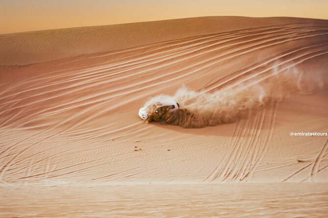 Overnight Desert Safari with BBQ Dinner & Breakfast Abu Dhabi - Belly dance, tanoura, and fire performances