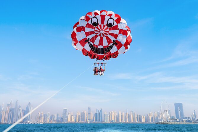 Parasailing in Dubai with Palm Jumeirah and JBR Beach views - Key points before you book