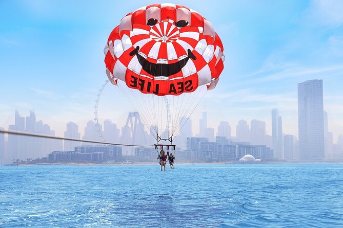 Parasailing in Dubai with Palm Jumeirah and JBR Beach views - Harnessing up at JBR Beach