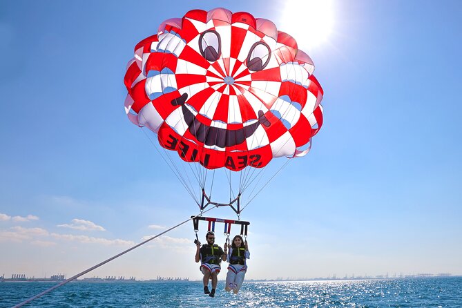 Parasailing in Dubai with Palm Jumeirah and JBR Beach views - Booking and cancellation details to keep in mind