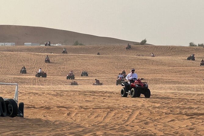 Premium Desert Safari Activities for Group and Family - Sunset photos from the top of a dune