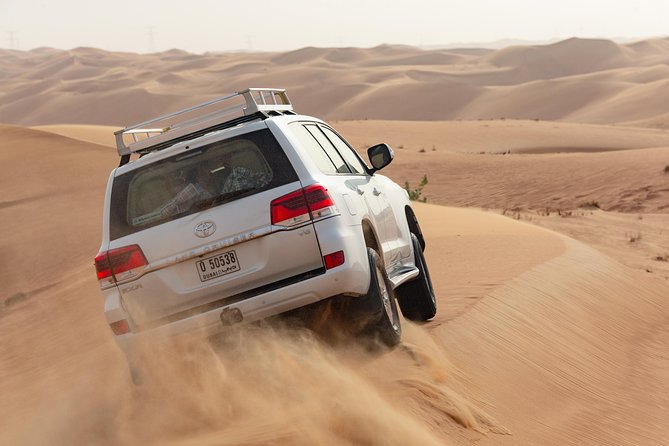 Premium Dubai Desert Safari with BBQ Dinner in the Red Dunes - Key Points Before You Book