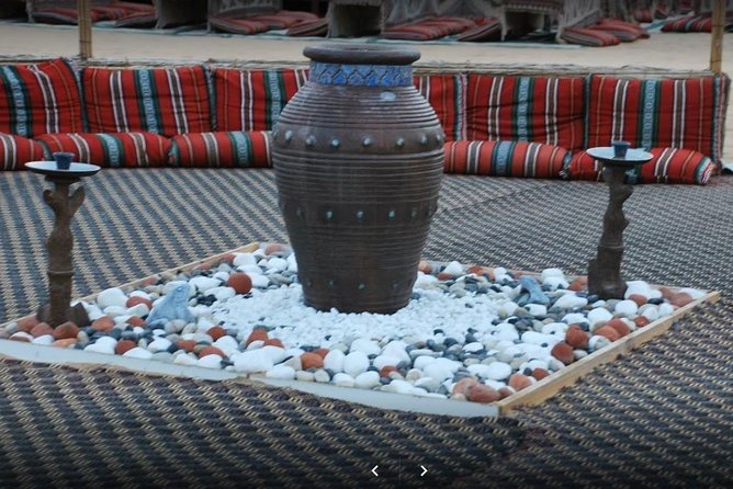 Private Desert Safari Red Dune with BBQ, Sand Boarding and Camel Ride - Camel farm and a short traditional ride