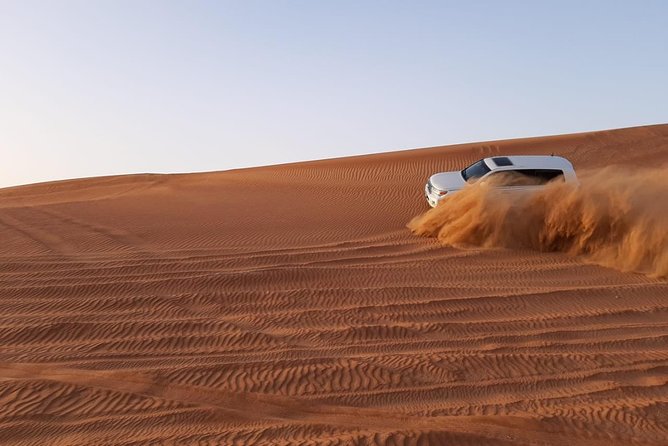 Private Desert Safari Red Dune with BBQ, Sand Boarding and Camel Ride - The camp’s Arabic coffee, henna, and shisha