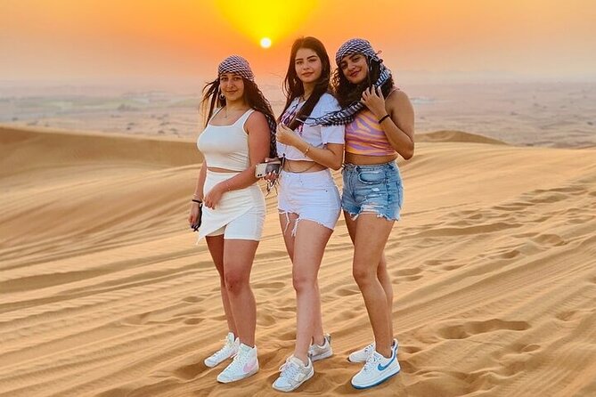Private Evening Red Sand Desert Safari with BBQ Dinner - The camel ride and henna stop