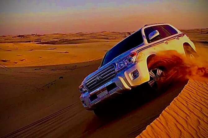 Private Evening Red Sand Desert Safari with BBQ Dinner - Belly dance, Tanura, and a fire show