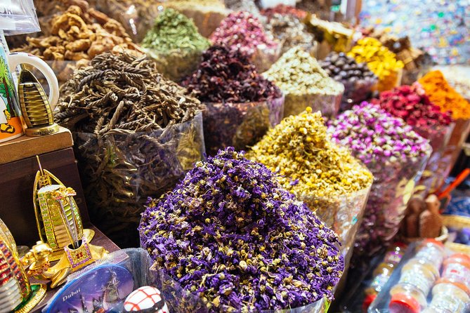 PRIVATE Food Tour: The 10 Tastings of Dubai With Locals - Textile Souk and the walk through Bur Dubai