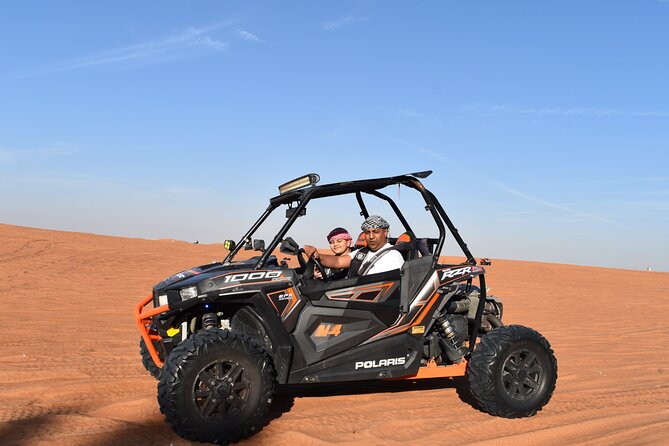 Private Red Dune Buggy Adventure: Safari and BBQ Dinner Included! - The desert camp turns into an evening show