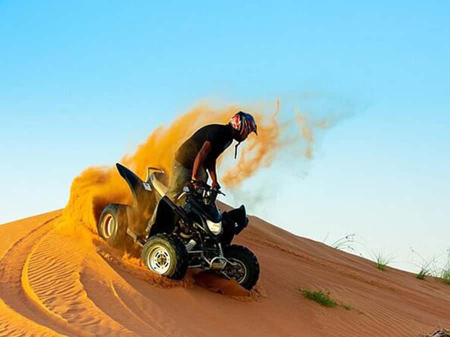 Ras Al Khaimah: Guided Quad Bike Tour - Reaching the red dunes from Ras Al Khaimah