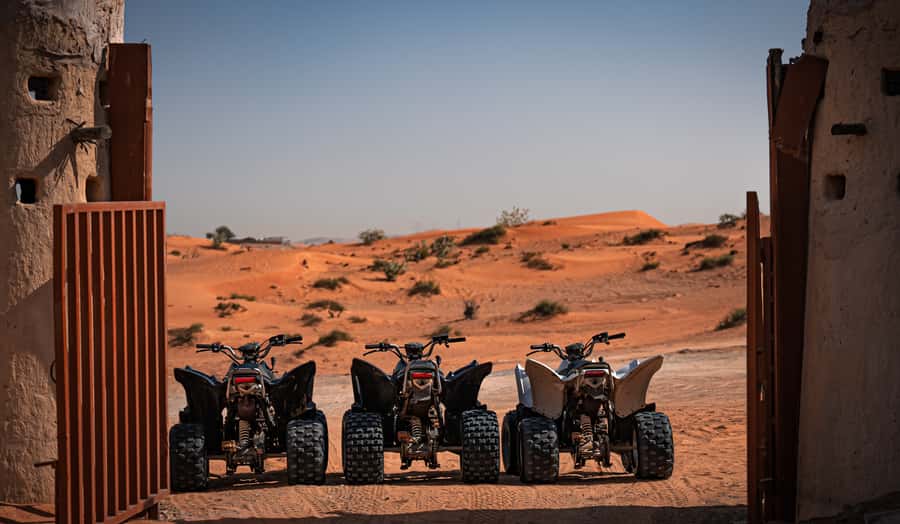 Ras Al Khaimah: Guided Quad Bike Tour - Stops for camels and desert photographs