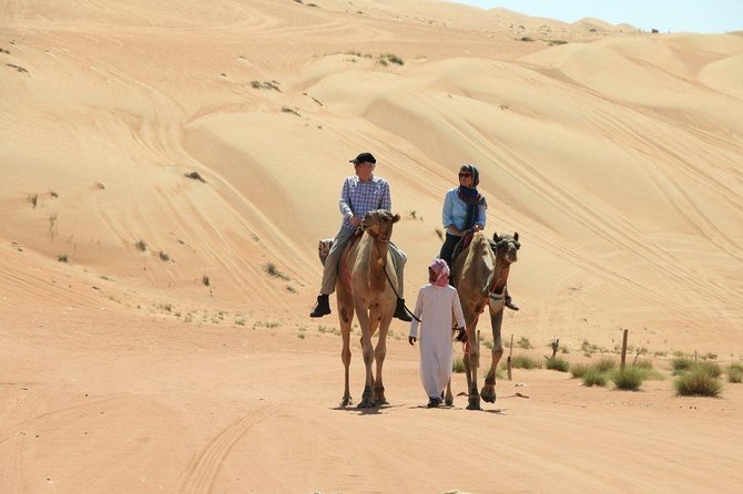 Red Dune Desert Safari with BBQ Dinner, Sand Boarding Dance Shows - The afternoon pickup and ride into the desert