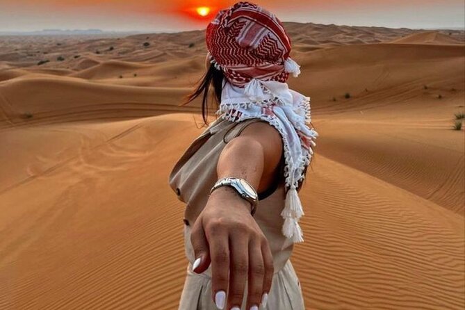 Red Dunes Desert Safari 4x4 Pickup & Drop, Camel Ride BBQ & Shows - Two hours among Dubai’s high red dunes