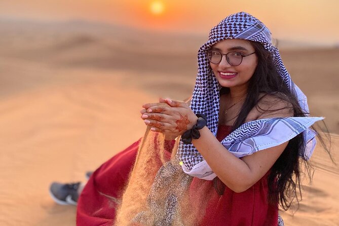 Red Dunes Desert Safari 4x4 Pickup & Drop, Camel Ride BBQ & Shows - Arabic coffee, dates, henna, and costume photos