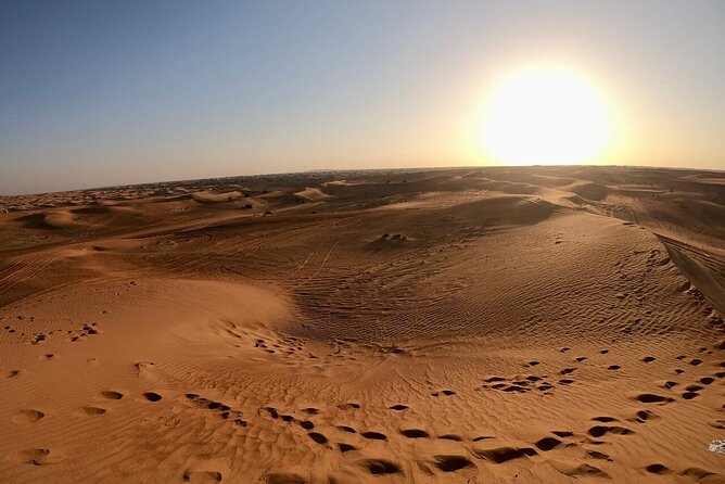 Red Dunes Desert Safari Dubai with Dinner Buffet, Show & Transfer - Entering the desert camp after dark