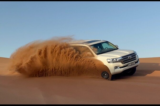 Red Dunes Desert Safari Dubai with Dinner Buffet, Show & Transfer - Belly dancing, Tanoura, and the fire show