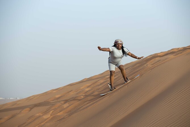 Sand boarding Camel ride and 1 hour ATV in Dubai Lahbab Red Dunes - The 2:00 pm pickup and ride into the desert