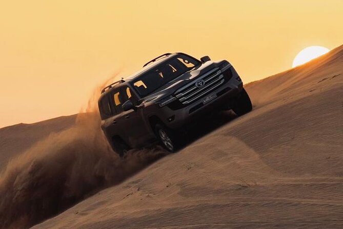 Sand Rail Dune Buggy Adventure with Sandboarding & Camel Riding - Sandboarding adds a different kind of thrill