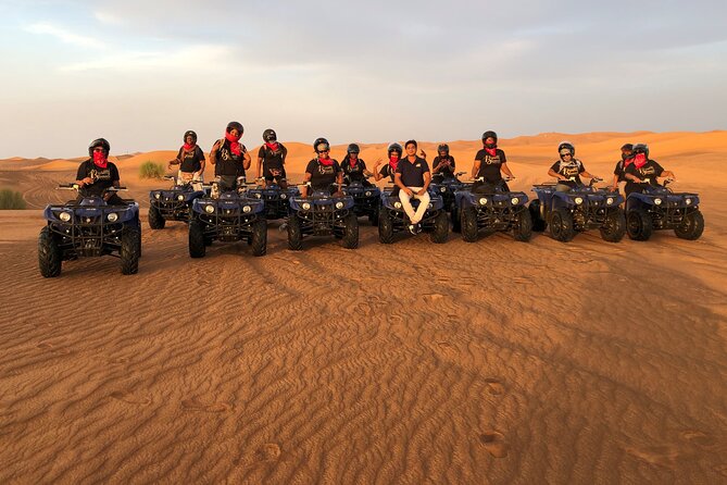 Self-drive Quad Bike with Sand Boarding and Camel Ride in Dubai - Quad biking across the Arabian dunes