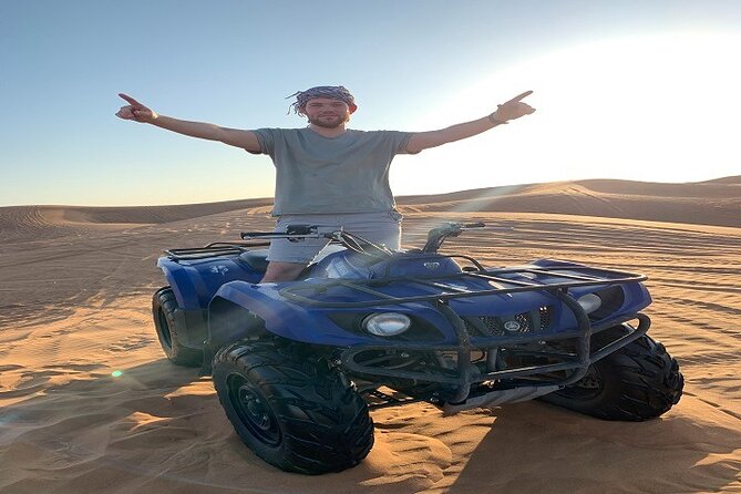 Self-drive Quad Bike with Sand Boarding and Camel Ride in Dubai - Sand boarding on the slopes