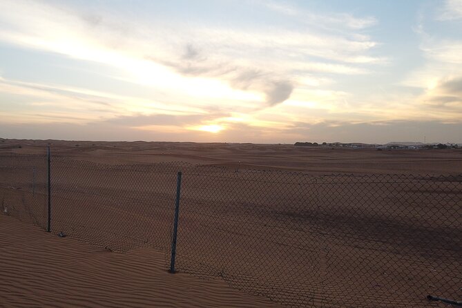 Shared Desert Safari Tour Dubai with Dinner Included - Entering the Bedouin-style camp at Lahbab