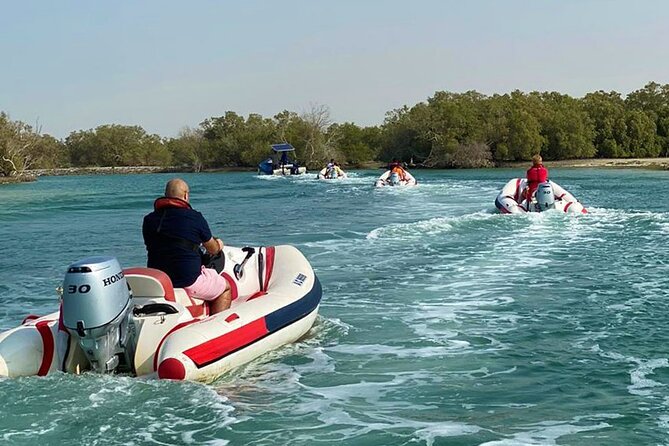 Small-Group Self-Drive Speedboat Tour in Yas Island Mangroves - Peninsula Gold Beach and the swimming stop