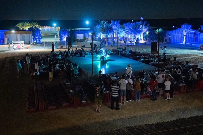 Standard Desert Safari, camel ride, BBQ Dinner, Belly Dance Show, Pick & Drop - The Bedouin-style camp after dark