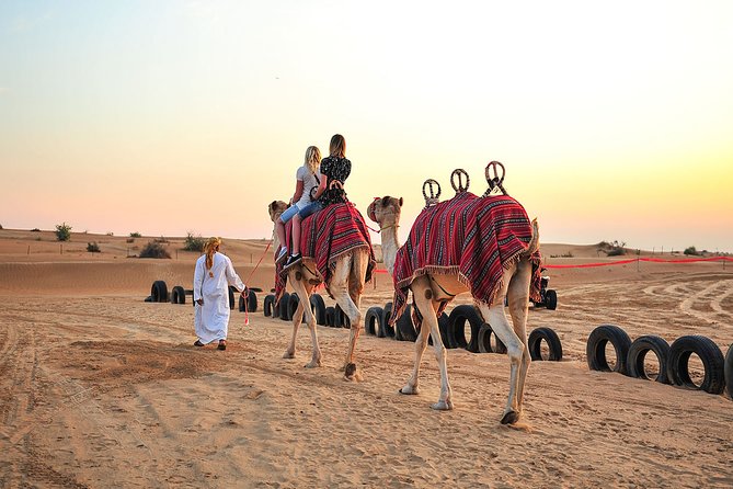 Sunset Camel Trek & Red Dunes Safari with BBQ at Al Khayma Camp From Dubai - Leaving Dubai in an air-conditioned Land Cruiser