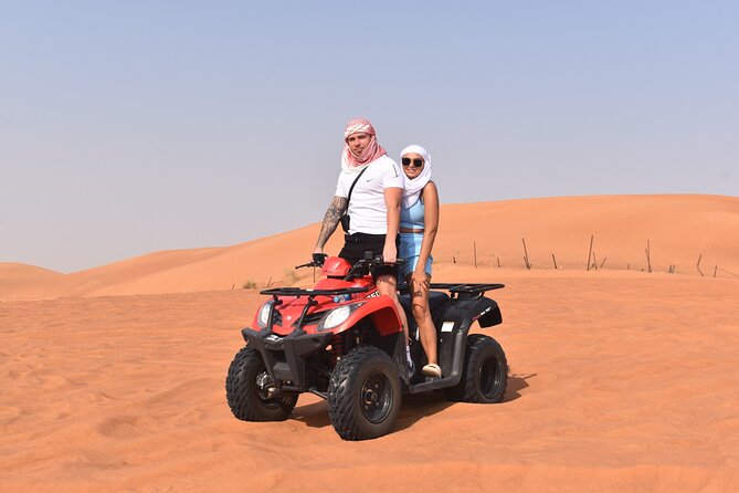 Sunset Desert Safari Quad bike Camel ride Sand Board & BBQ Dinner - Key Things to Know Before You Book